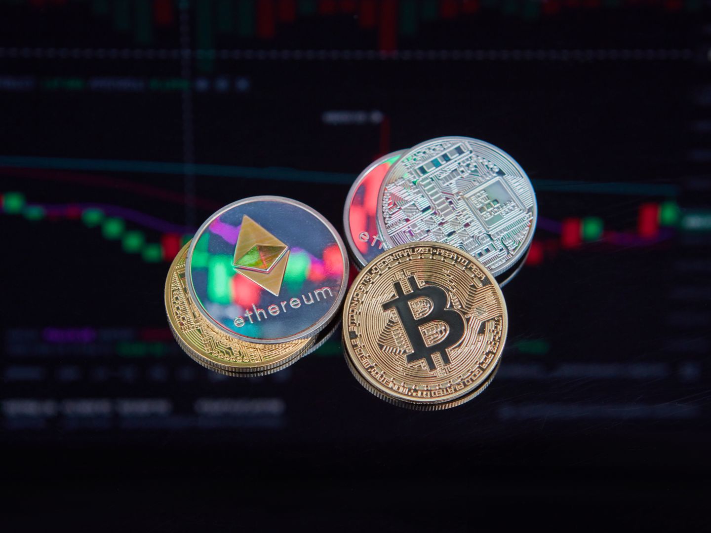 Floating Bitcoin and Ethereum coins with a market trend chart in the background symbolizing digital finance.